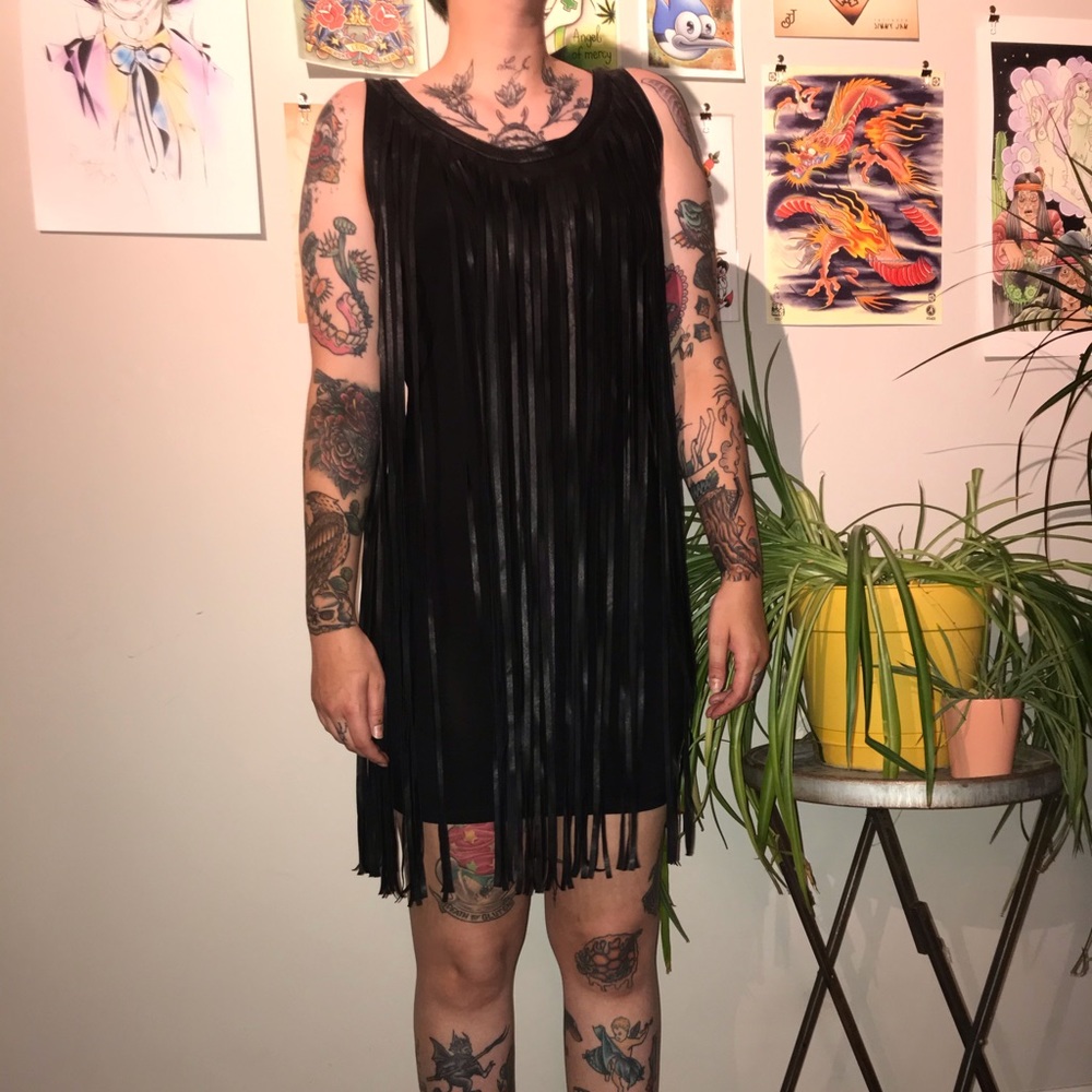 Black leather look mini dress. Size large.